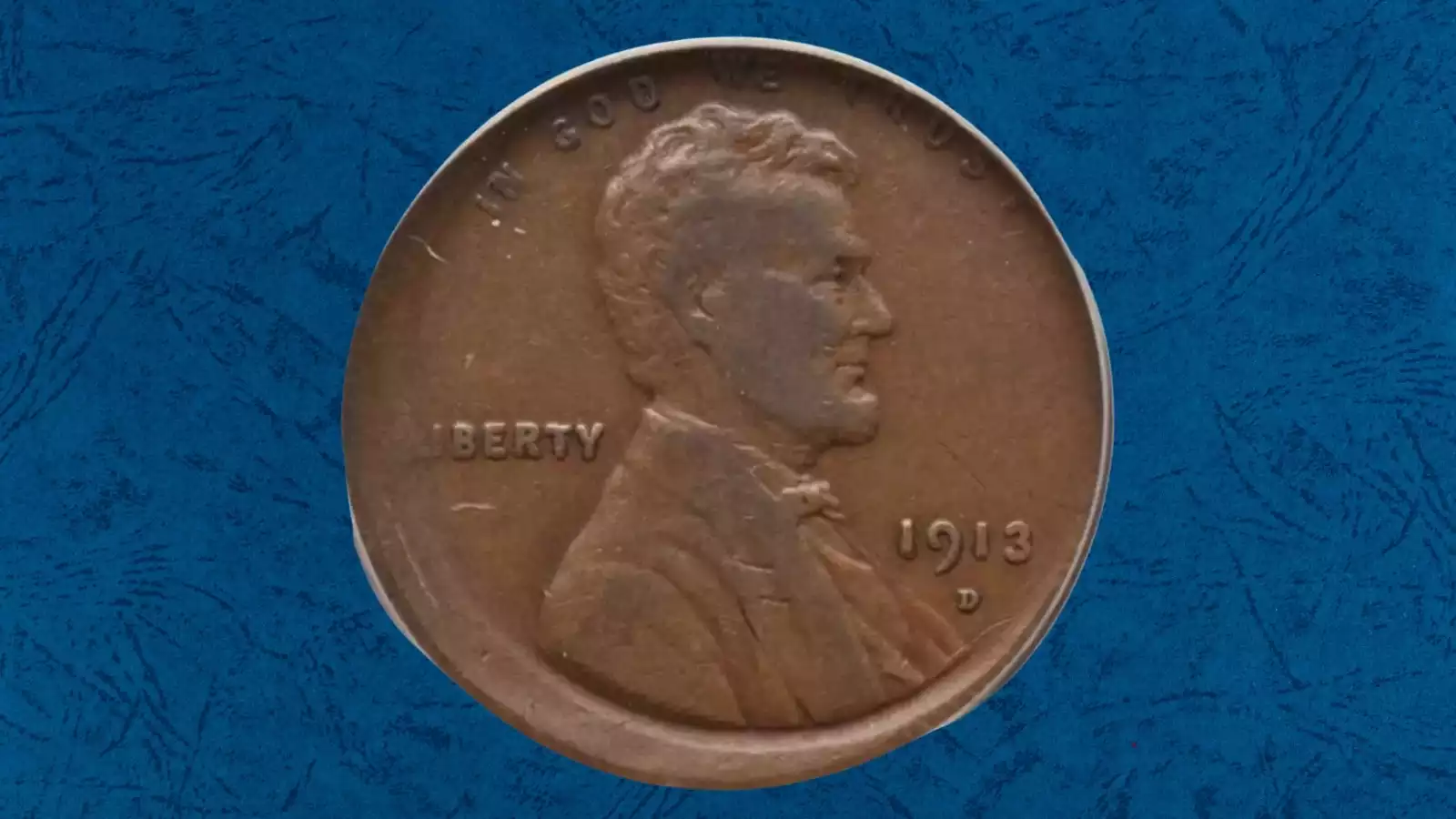 1913 Lincoln wheat penny off-center strike error showing blank crescent and partial date