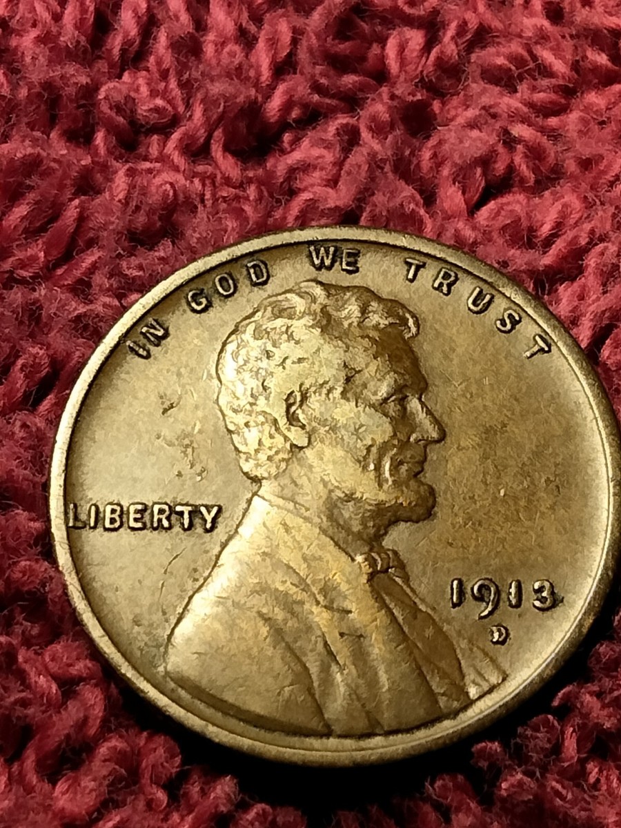 1913 Lincoln wheat penny struck-through grease error showing weak or missing design detail